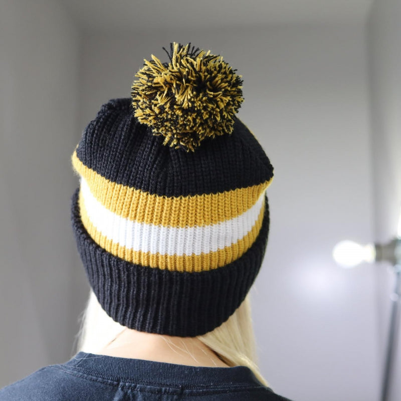 BRIXTON / KIT POM BEANIE (BLACK/OFF WHITE/BRIGHT GOLD)