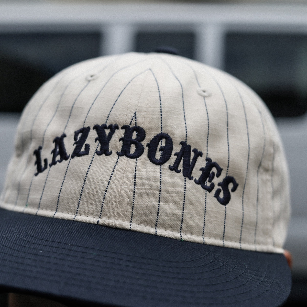 LZBN / EMB ARCH LOGO BASEBALL CAP (CREAM STRIPE/NAVY)