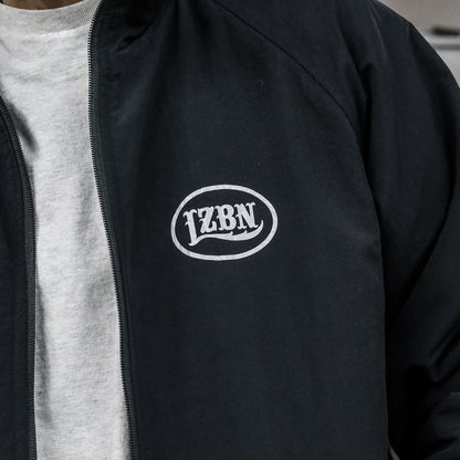 LZBN / HOLLOW OVAL LOGO REVERSIBLE JACKET (BLACK/BLACK)